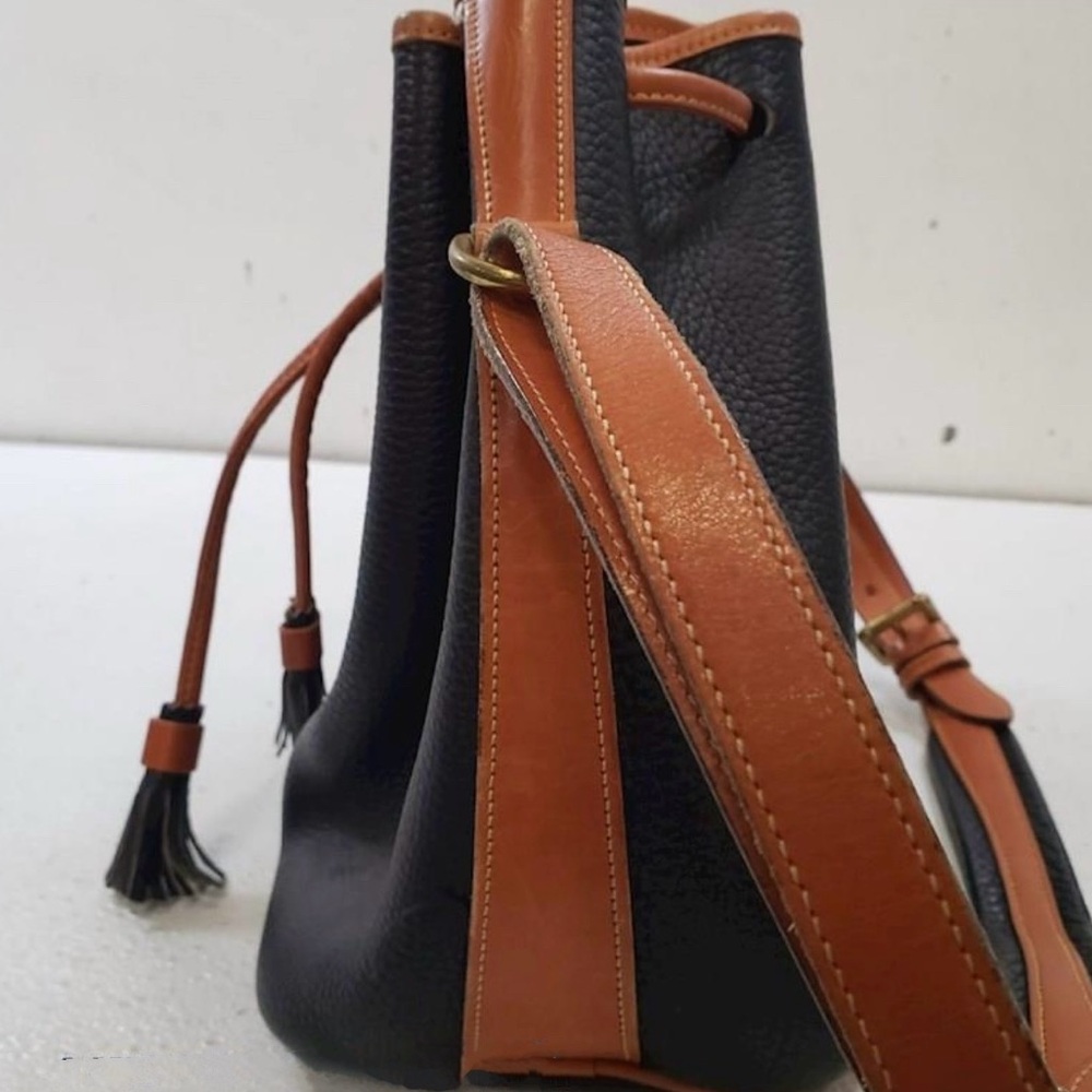 New Dooney & Burke Pebble Grain Leather
Drawstring Crossbody Bucket Bag. - Picture 9 of 16